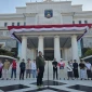Penyerahan santunan klaim asuransi kebakaran mikro kepada nasabah yang terdampak kebakaran di Desa Adat Sade (Dok: Istimewa)