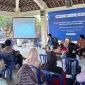 Suasana Kegiatan Mahasiswa BBK 8 Universitas Airlangga Bersama Bank Indonesia Kediri Gelar Sosialisasi Digitalisasi Sistem Pembayaran dan Perlindungan Konsumen di Desa Jatirejo
