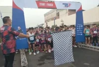 Yadi Rusmayadi membuka Fun Run 7K PodioRun