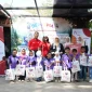 Ayah dan anak menunjukkan hasil kegiatan bersama sebagai bagian dari momen berharga BERGEMA 2026.